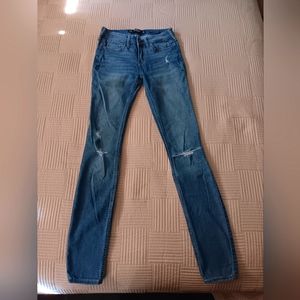 Hollister distressed super skinny jeans.